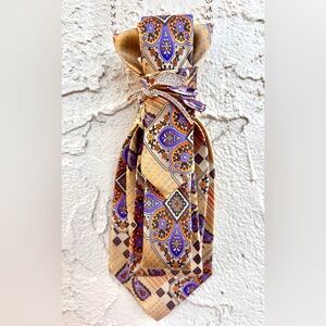 Silk tie necklace with flower brooch